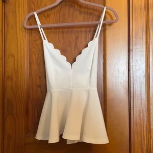 White cross back peplum top